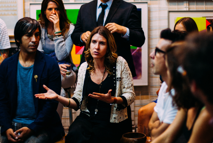 Person explaining two concepts with hand gestures