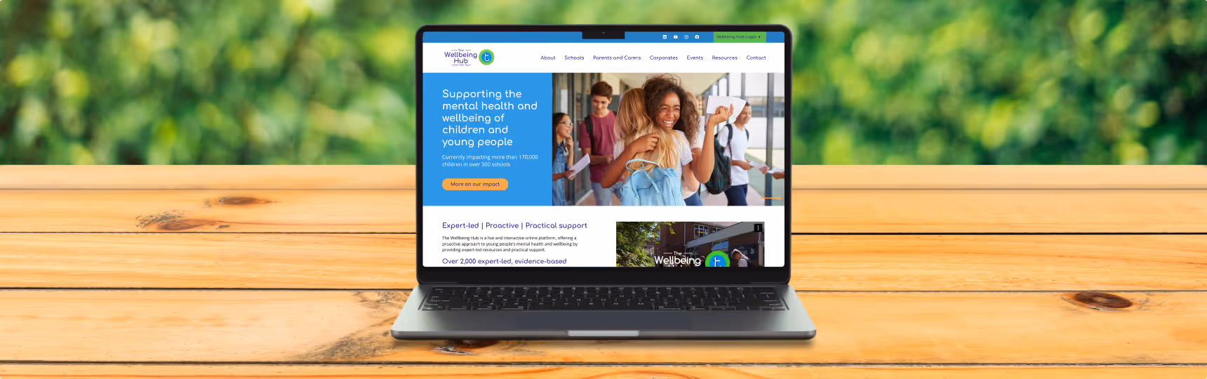 Wellbeing Hub website shown on laptop