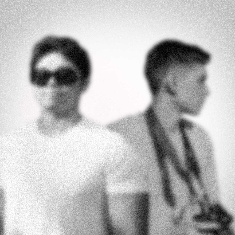 A creative photo composition of Joshua Chandar and Matthew Subade in black and white.