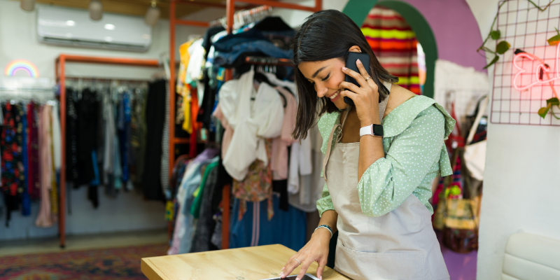 Small business owner talking on the phone about Bizcap line of credit
