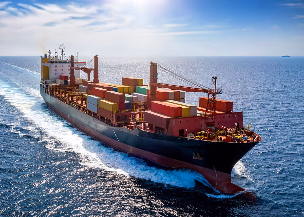 Container ship carrying green methanol cargo produced by AER Energy's carbon-negative gasification systems