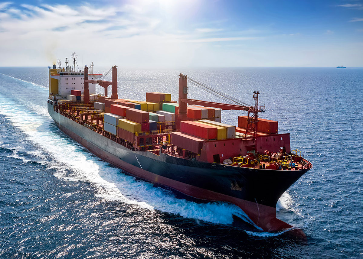 Container ship carrying green methanol cargo produced by AER Energy's carbon-negative gasification systems