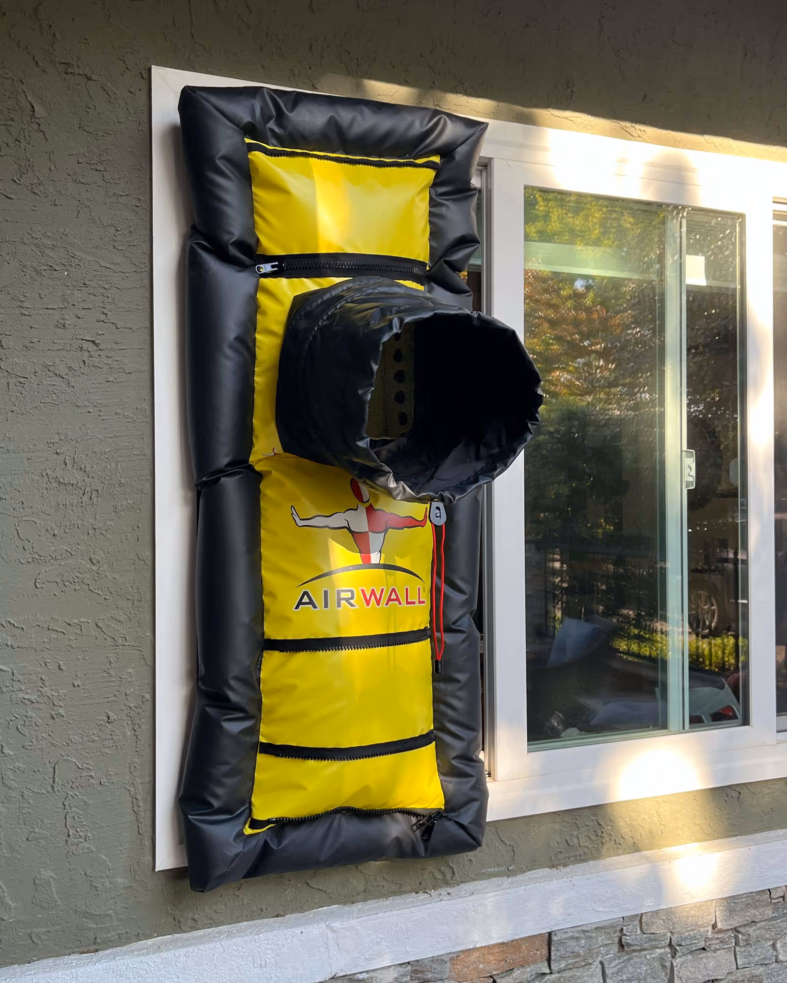 AirWall Xhaust in window of house