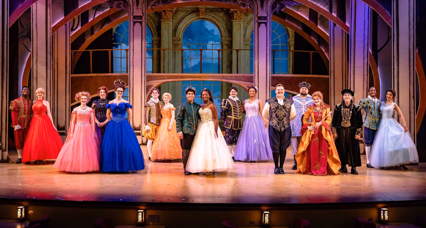 The cast of the Broadway musical Cinderella poses on stage.