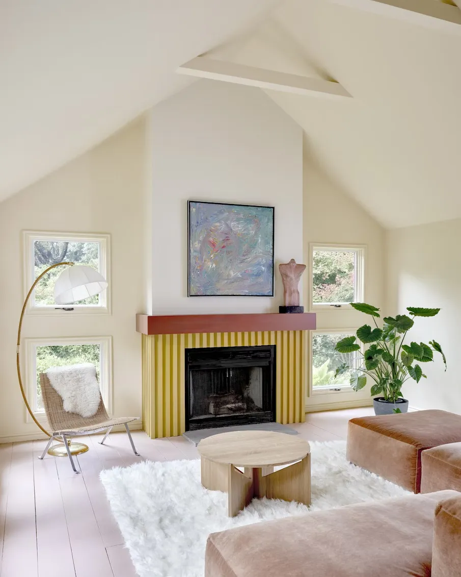 White living room with fireplace