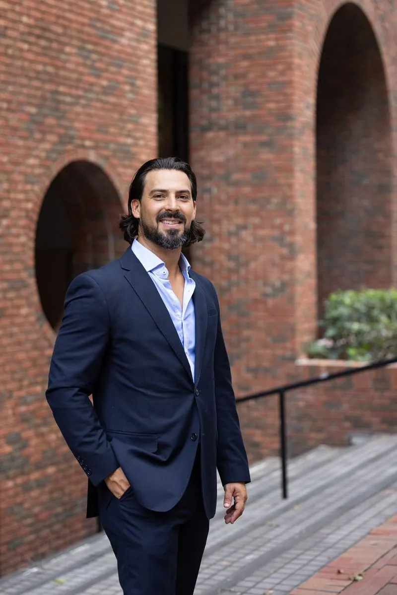 Rudy in a dapper blue suit