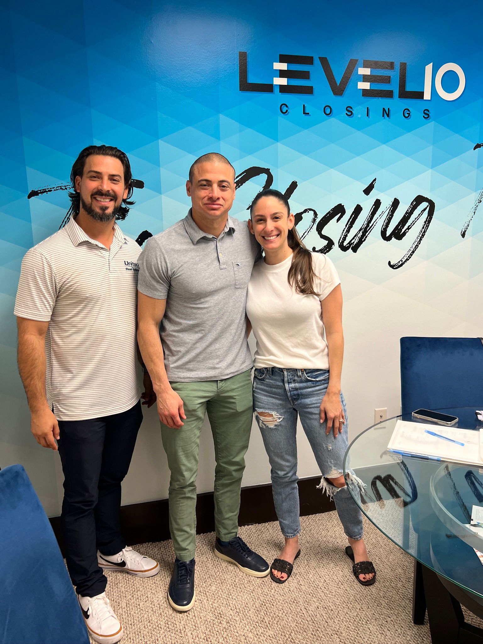 Rudy Helping Clients through the Closing process.