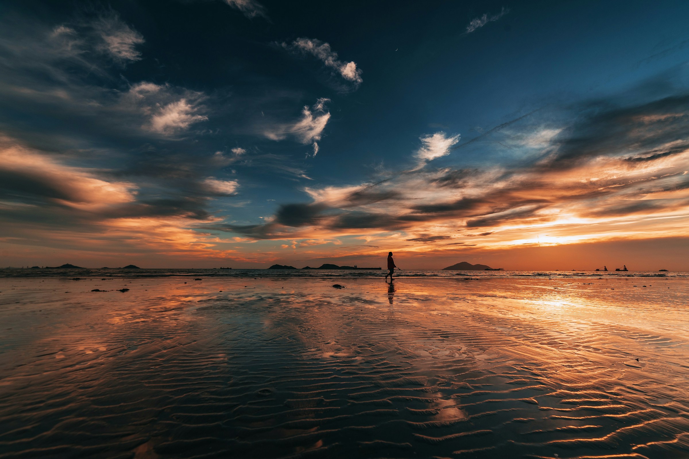 sunrise over a gently rippling lake