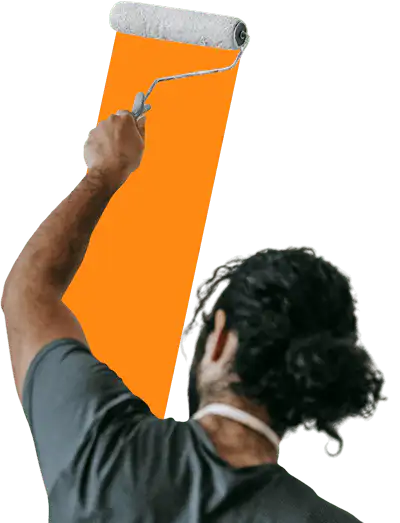 Painter rolling on paint to wall