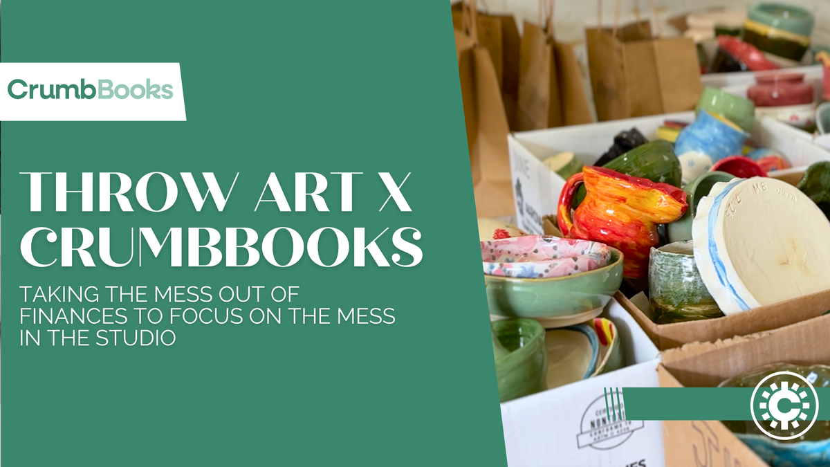 Colorful ceramic bowls and art supplies in CrumbBooks studio workspace