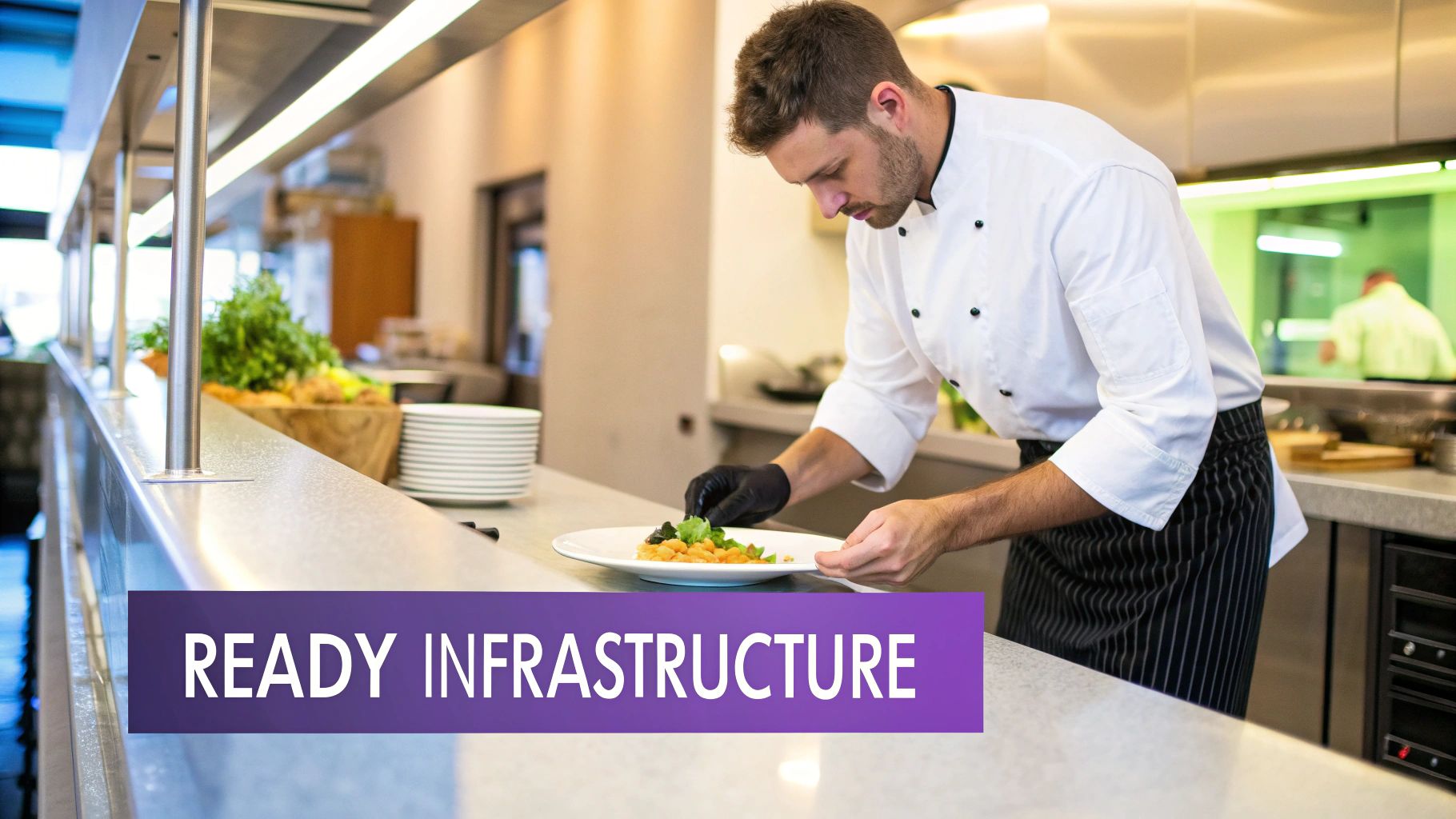A male chef in a professional kitchen meticulously plating a dish, wearing a white jacket and black gloves.