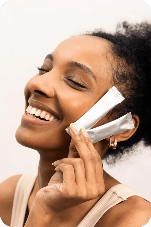 Smiling woman with Sova products in her hand