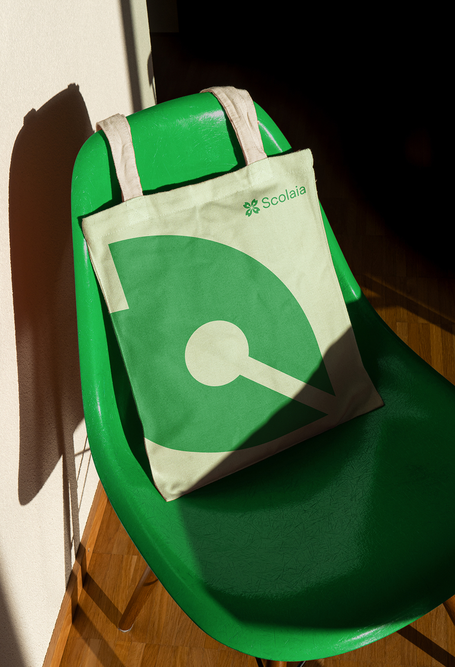 Canvas tote bag with Scolaia logo and oversized logo mark graphic