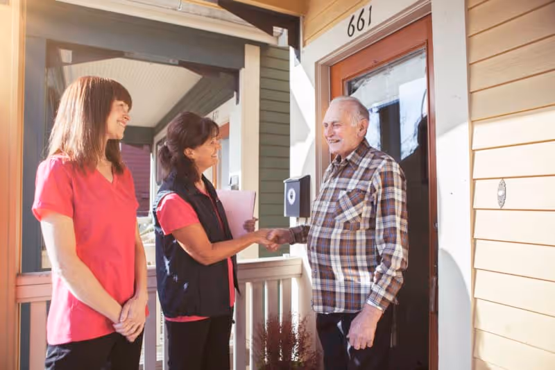 Older man meeting his Nurse Next Door Care Designer.