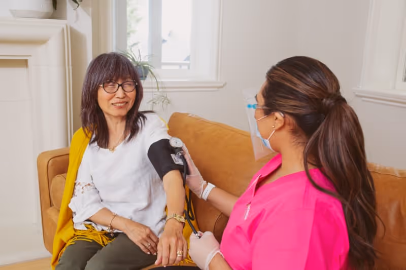 Nurse Next Door client having blood pressure checked.