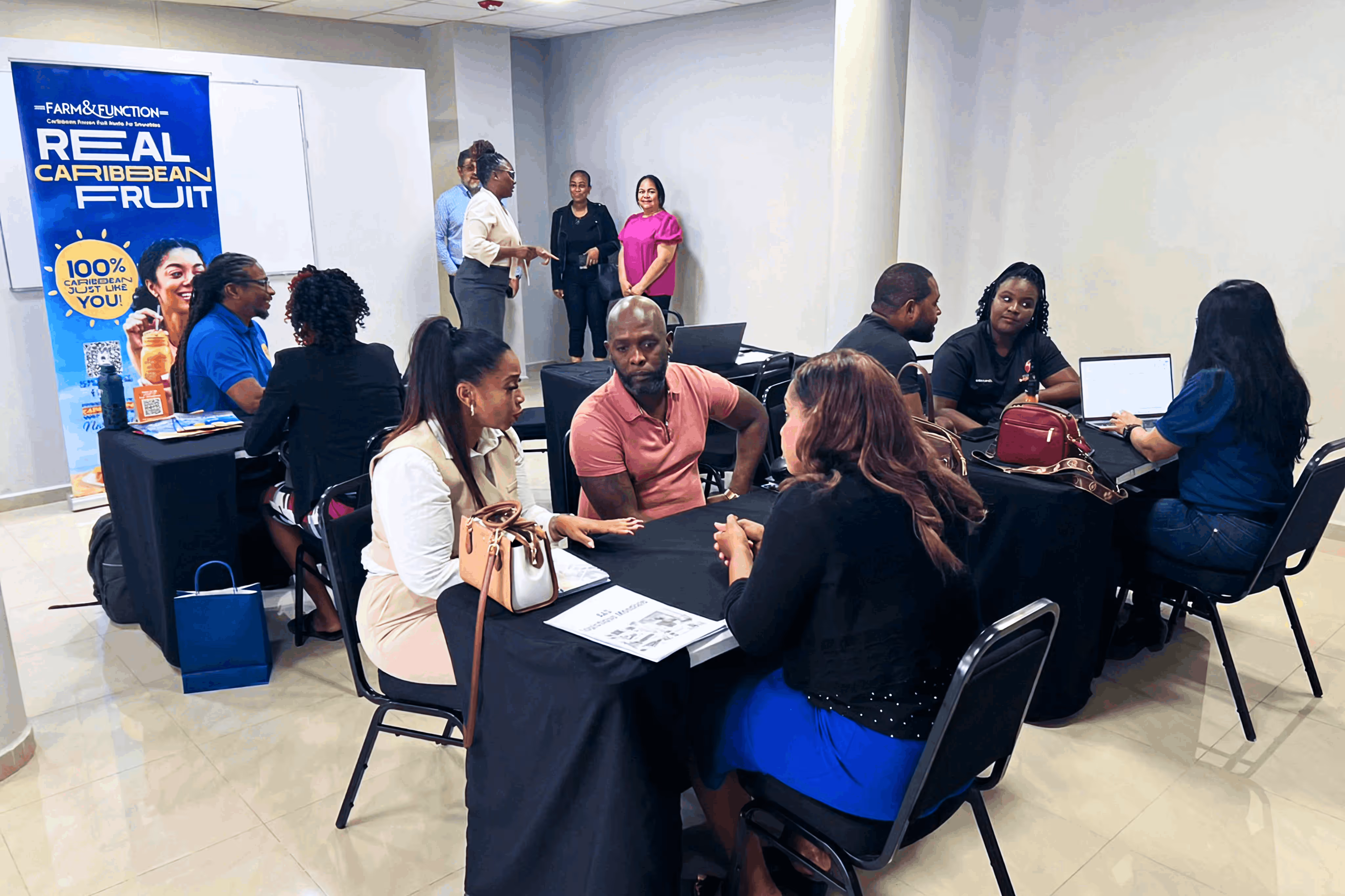 Group of new business owners in workshop of business registry.
Chamber of Commerce Curacao.