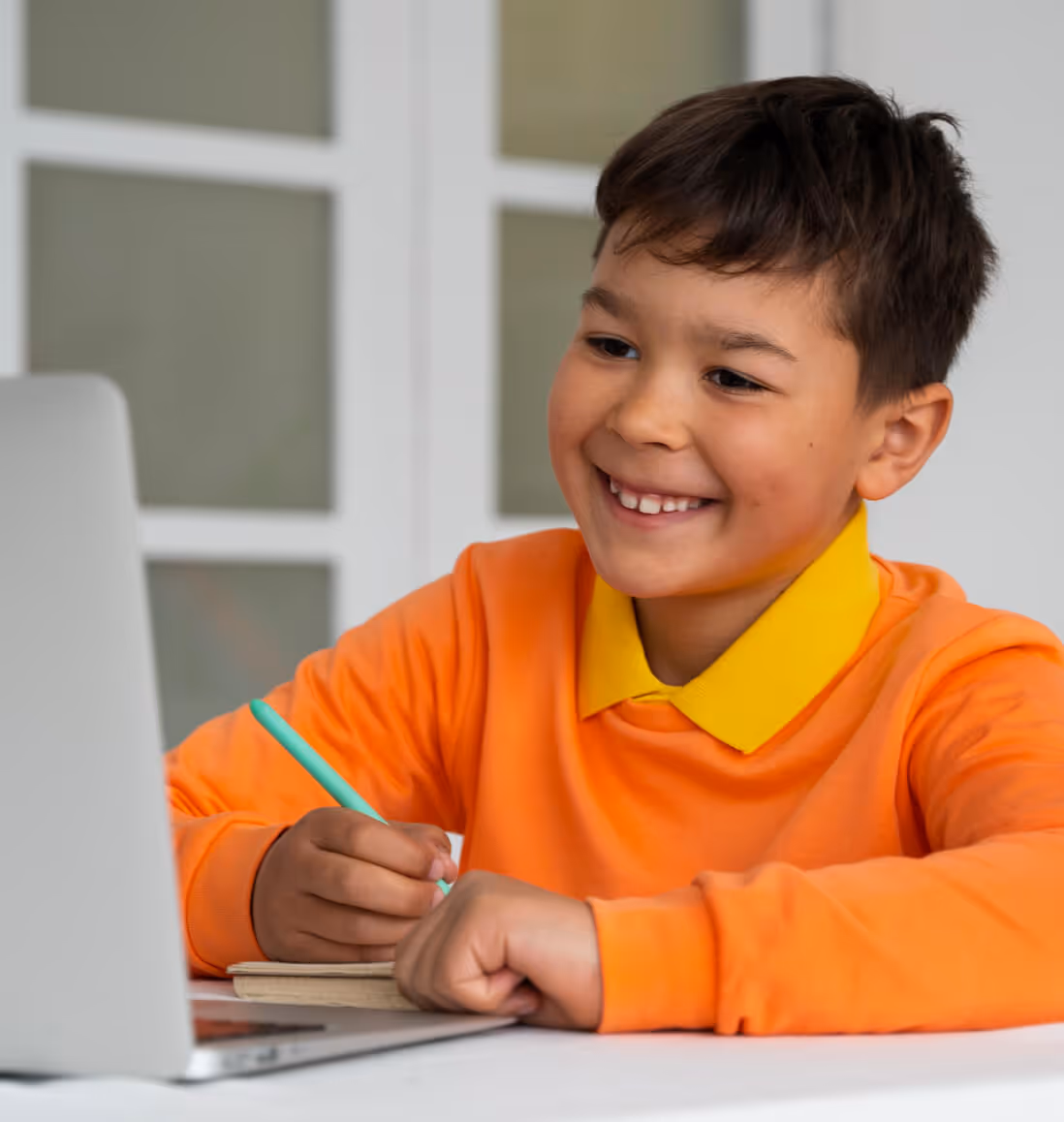 Child diligently working on a math worksheet for Level 3 kids math tutoring.