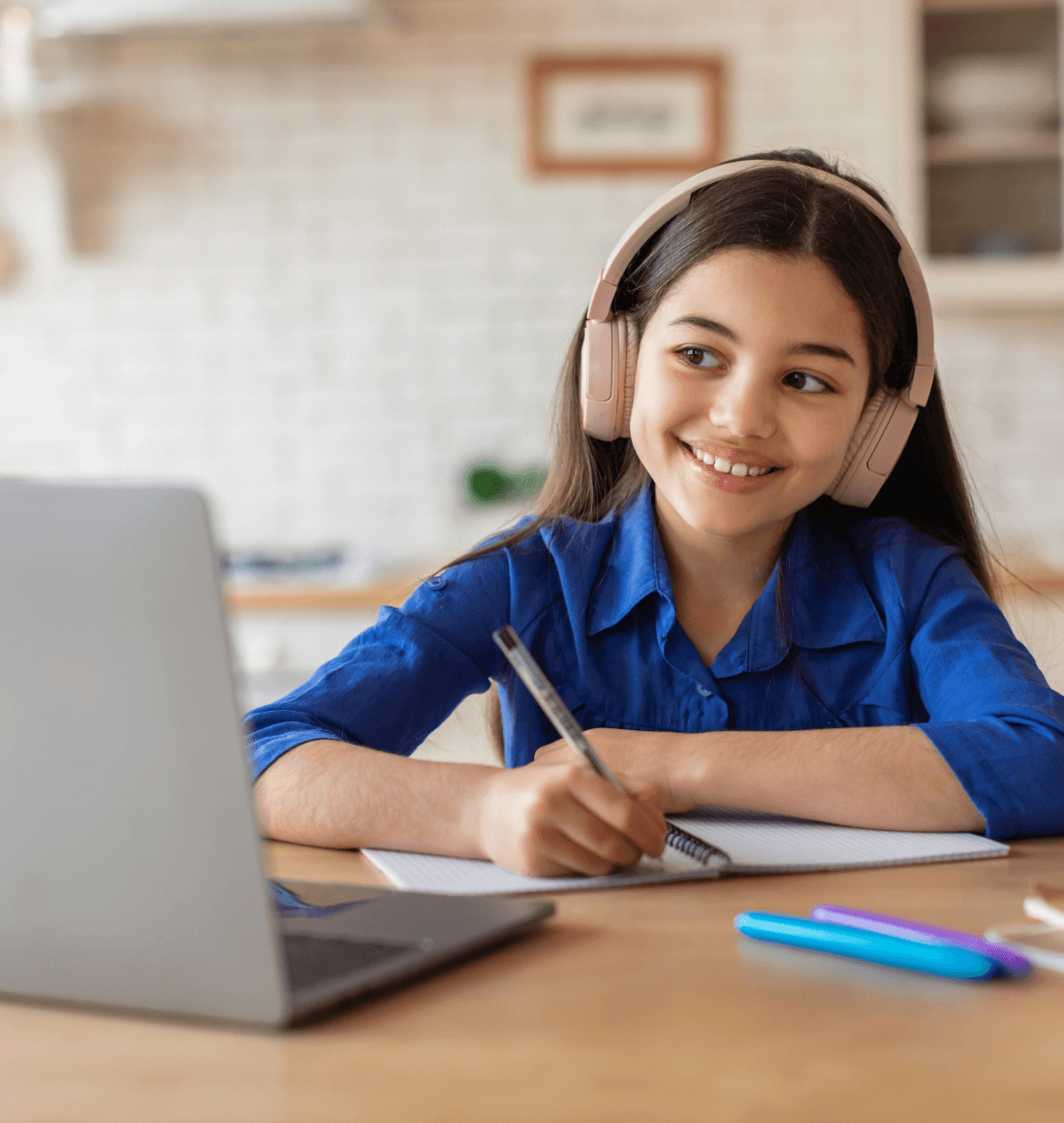 Student wearing headphones, learning Pre-Algebra concepts via online math tutoring for Curriculum Level 8.