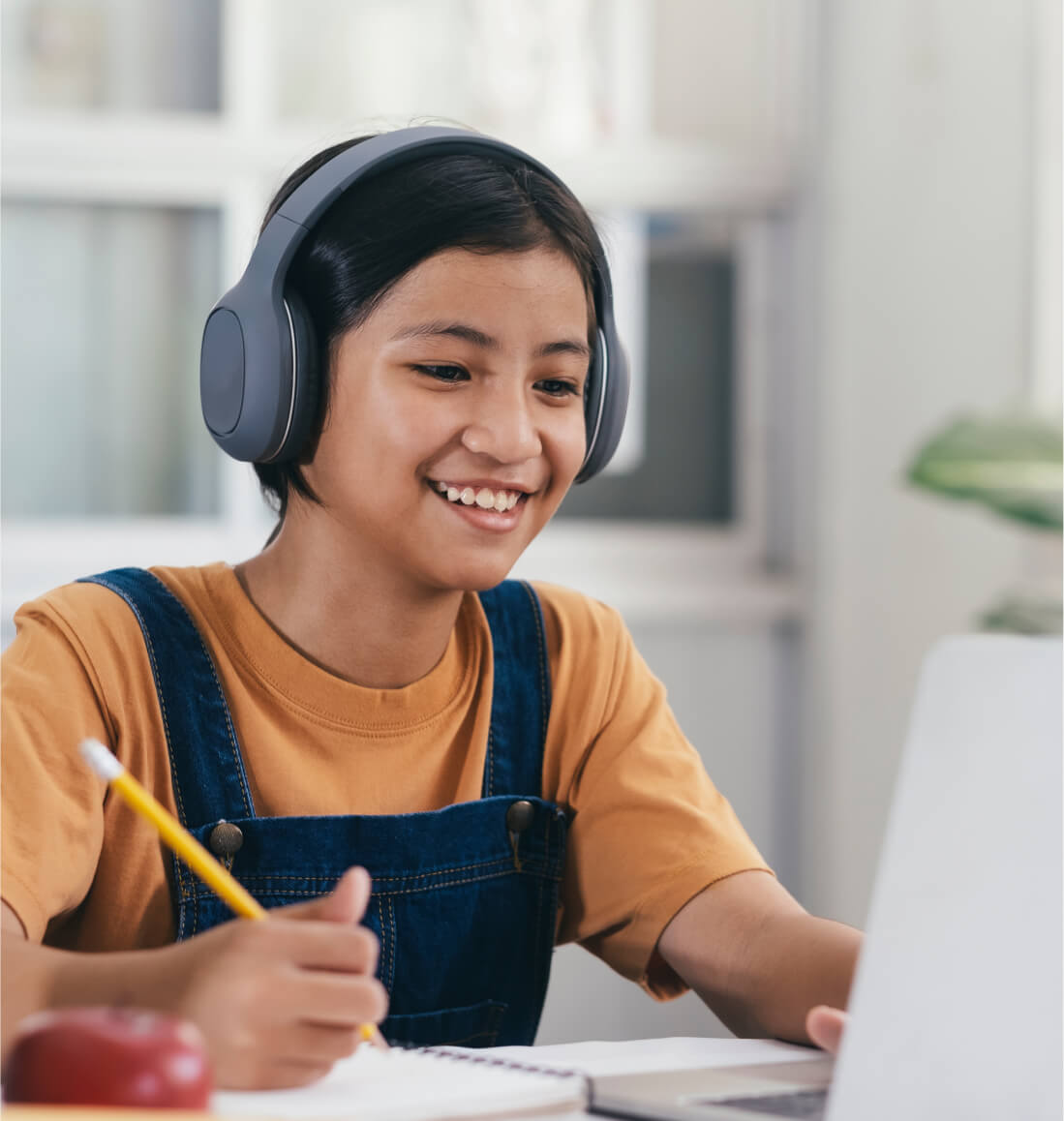 Happy student mastering advanced algebra concepts via online math tutoring for Curriculum Level 13.