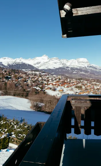 The Superior Room's private balcony overlooks the Combloux mountains.