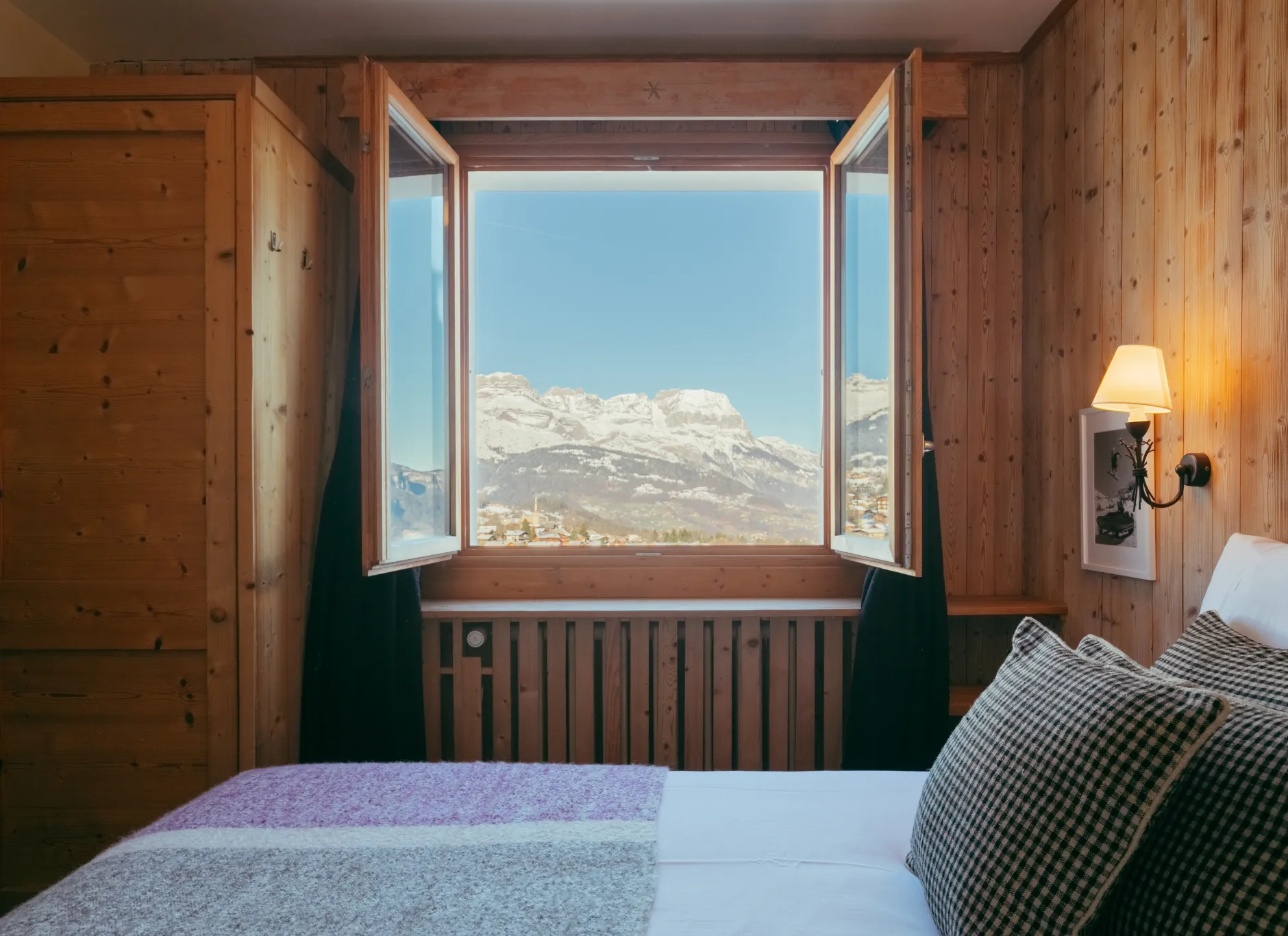 Premium room at Caprice des Neiges with mountain views from the window.