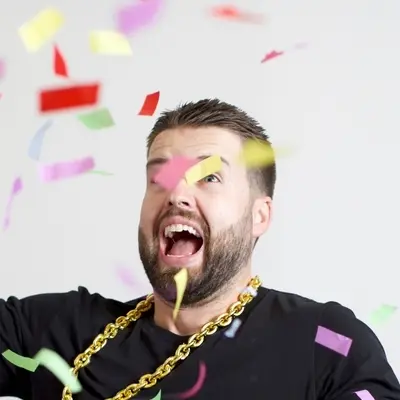 Portrait of Johnathan Dane, founder of KlientBoost