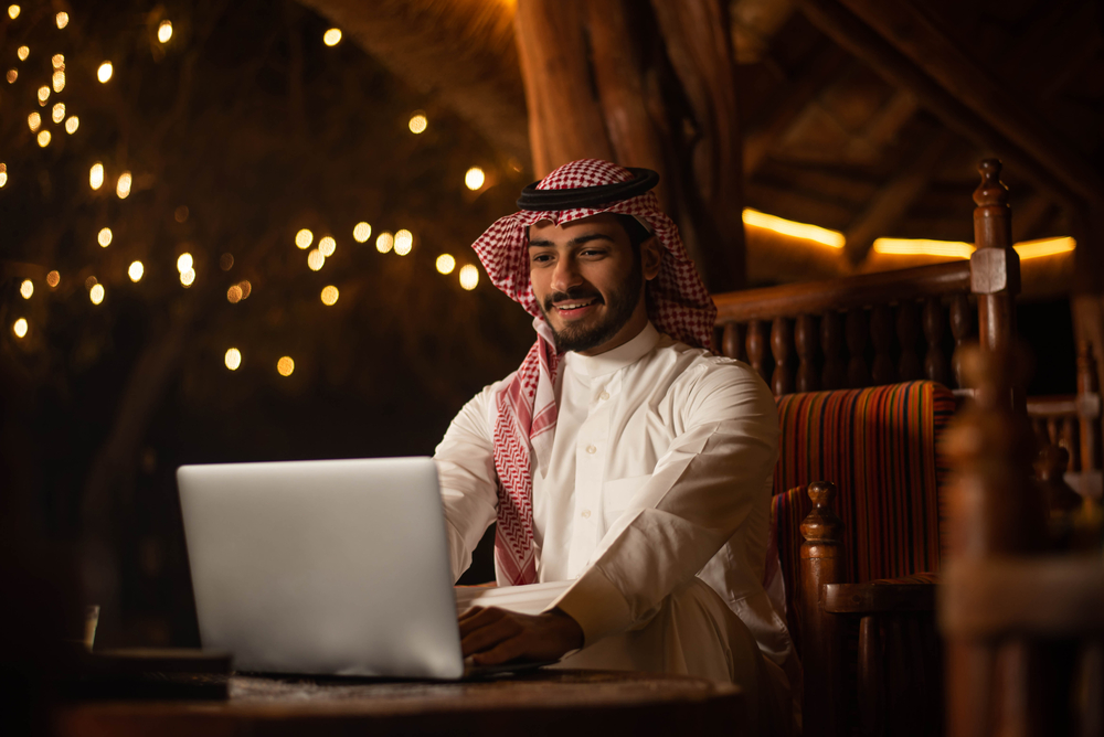 Man sitting and his laptop