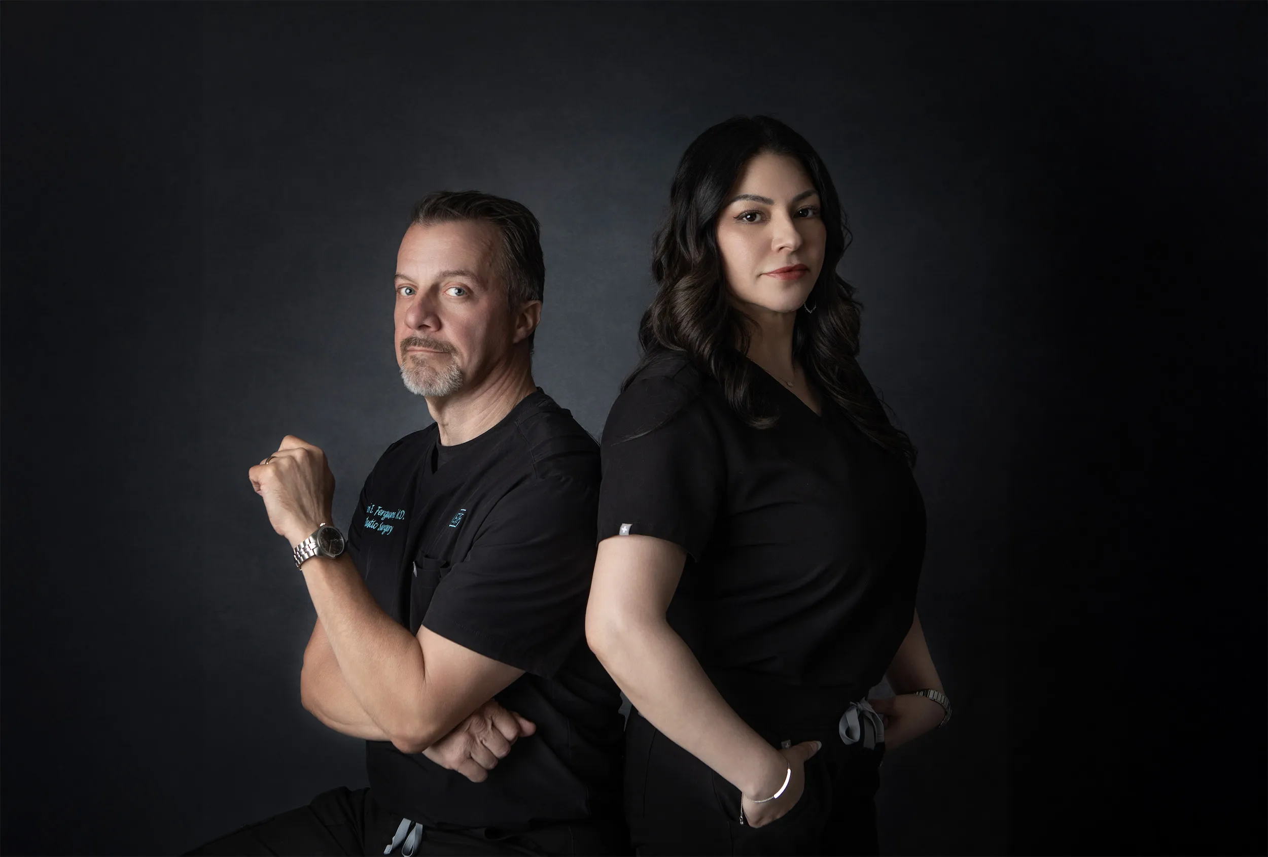Dr. Ferguson and Jessica Buentello posing for a professional portrait.