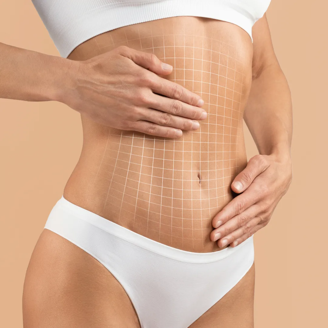 Woman examining her flat stomach with a grid overlay.