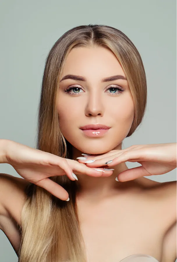 Young woman with long blonde hair and a natural look.