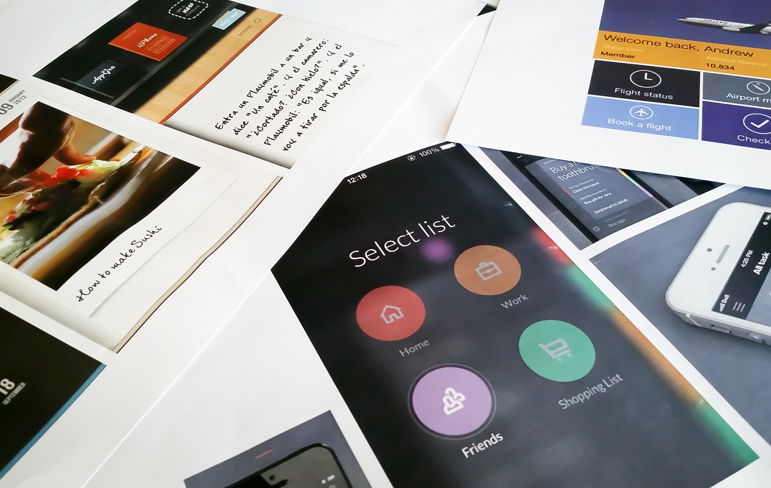 Benchmarking and research documents scattered on a table