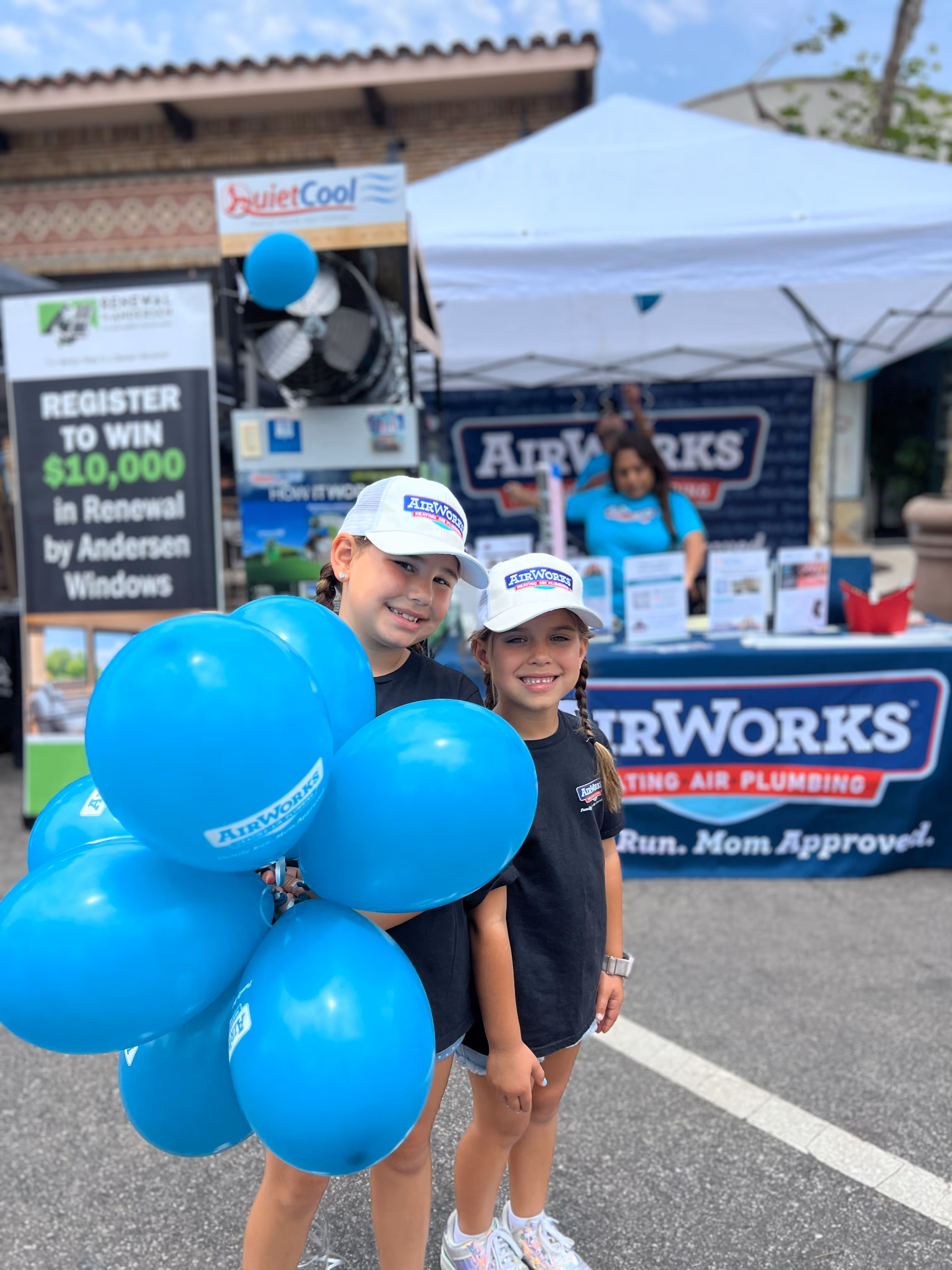 children holding a balloon