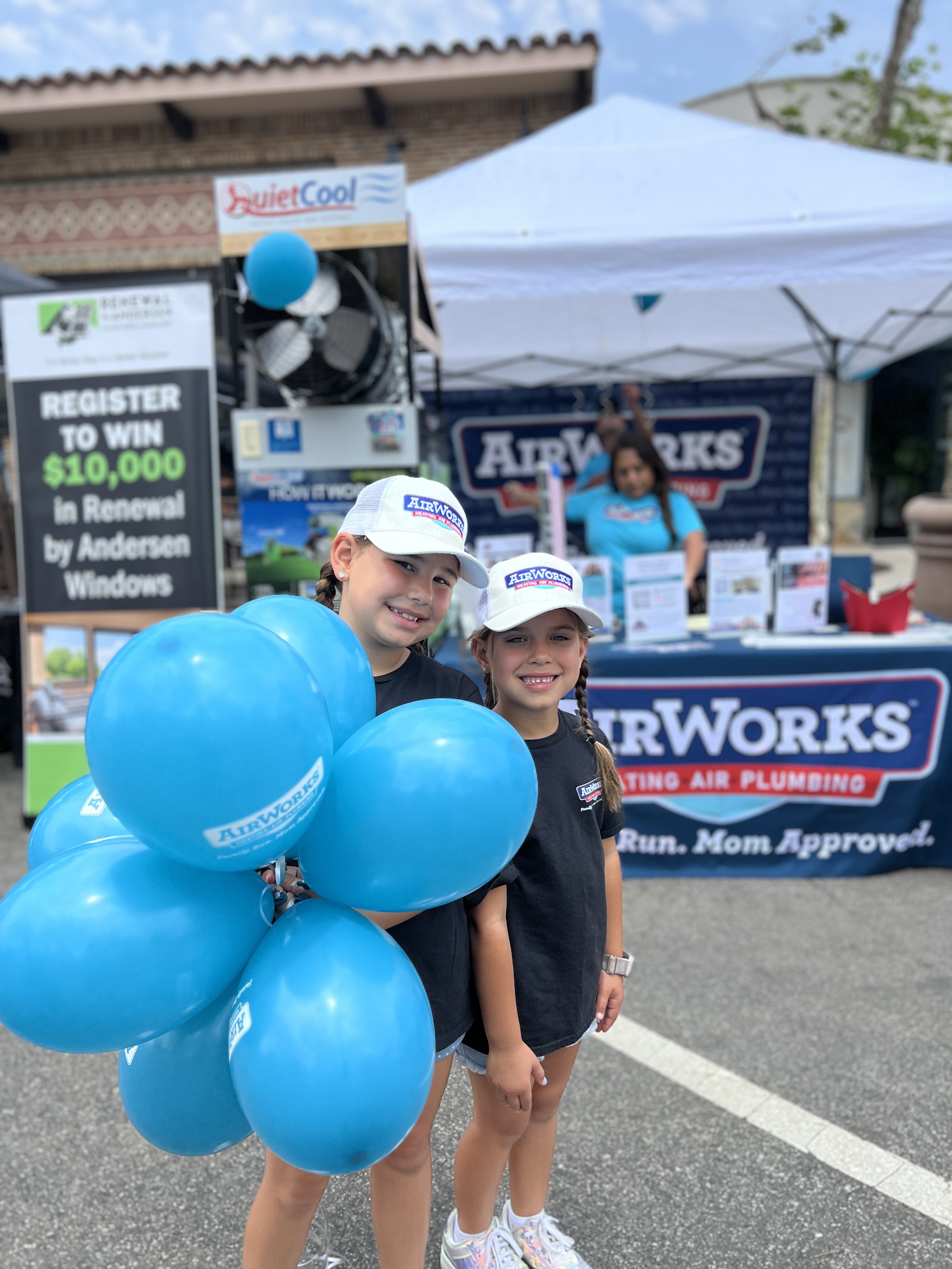 children holding a balloon