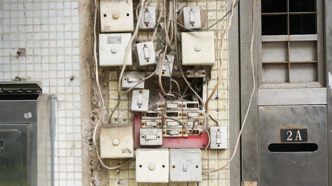 an electrical panel with labels for major appliances -  whole home generators installation