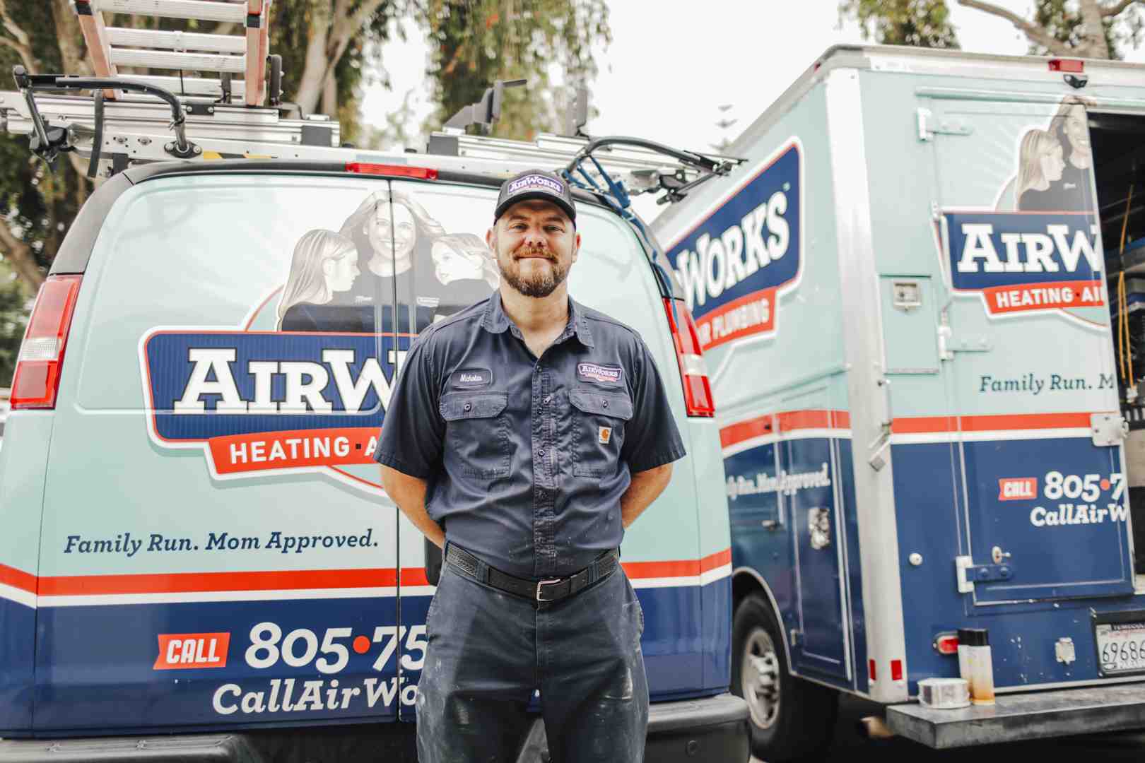 a professional technician arriving at a home in a clean service vehicle - 24 hour ac repair ventura ca