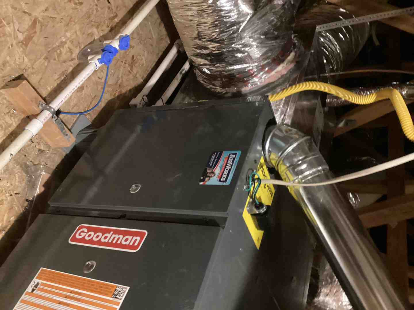 A professional blowing new insulation into an attic - attic insulation sacramento ca