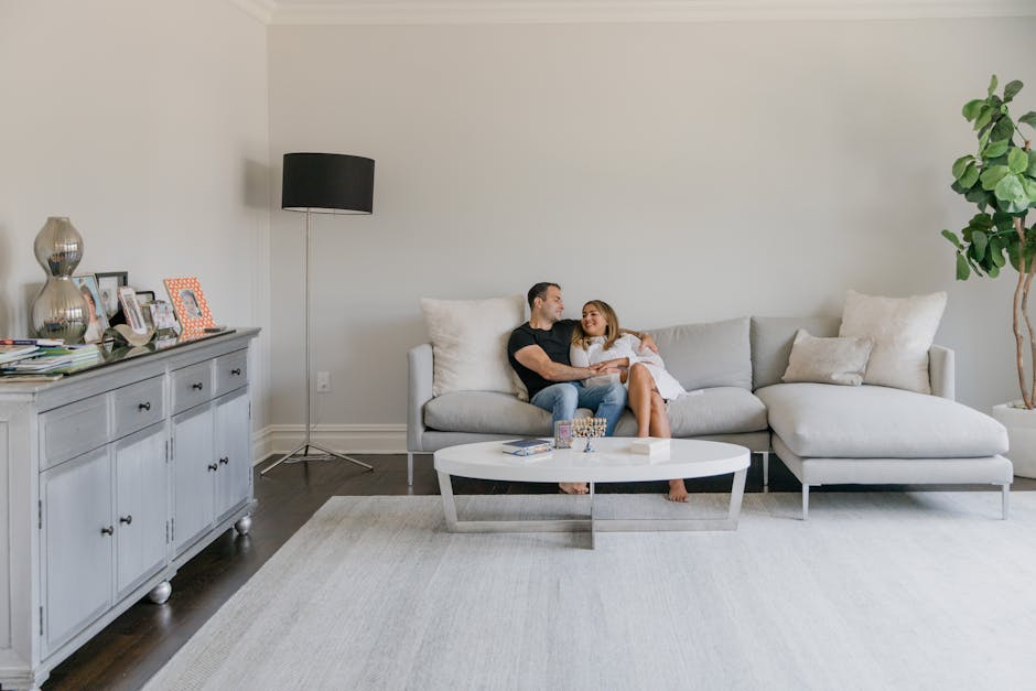 family relaxing comfortably indoors on a couch in a well-sealed home - home air sealing calabasas ca