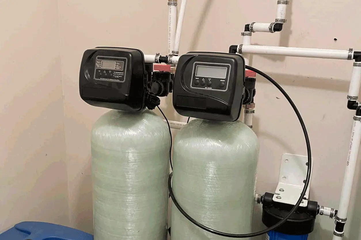 Twin water softener and neutralizer system.