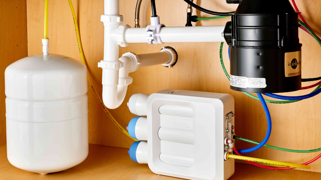 RO system installed under kitchen sink.