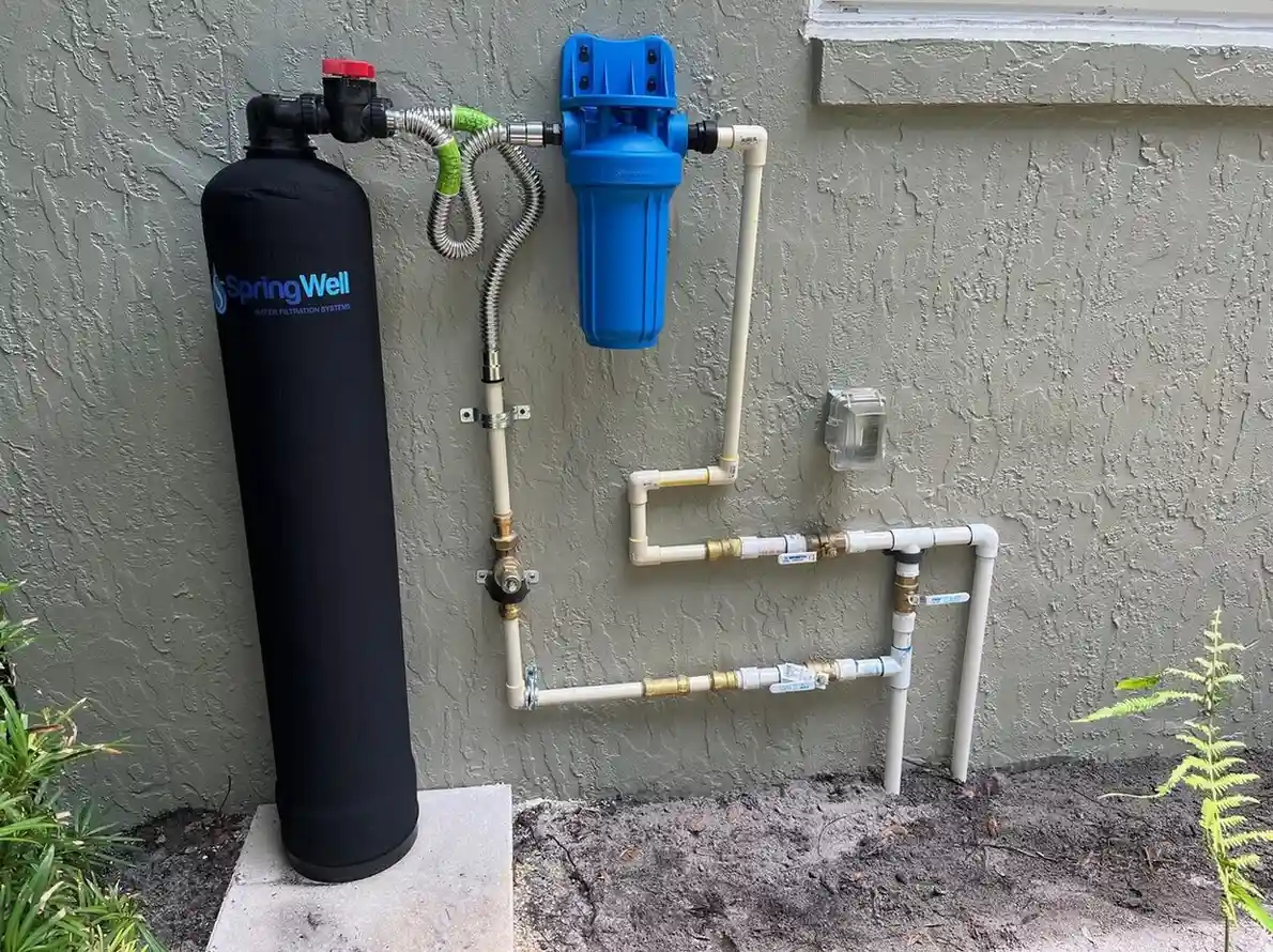 Whole house water filtration system installation.