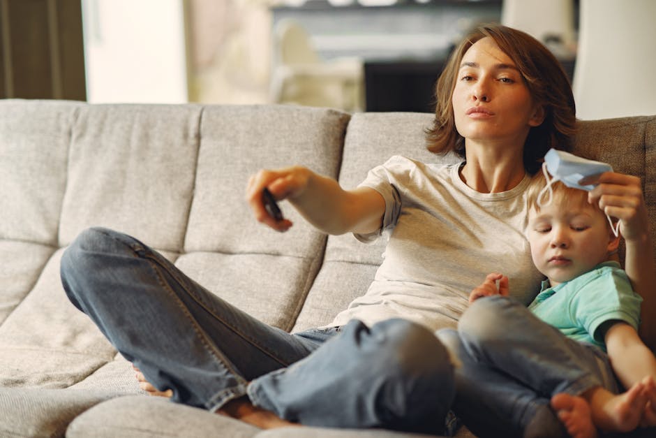 Family comfortably relaxing in their living room - smart thermostat installation newbury park ca