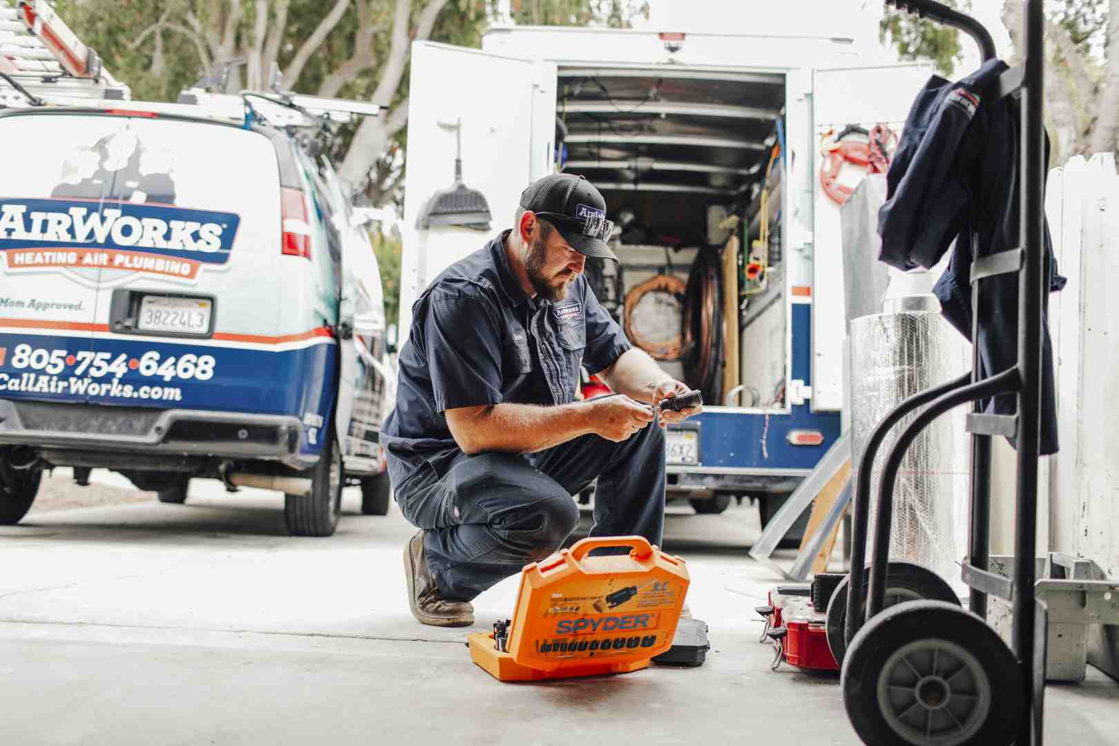 friendly, professional HVAC technician with a toolkit - hvac zoning upgrade newbury park ca