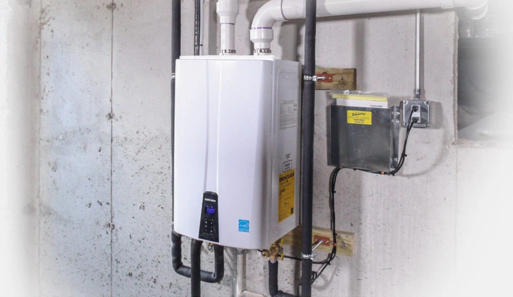 Indoor tankless water heater on wall.