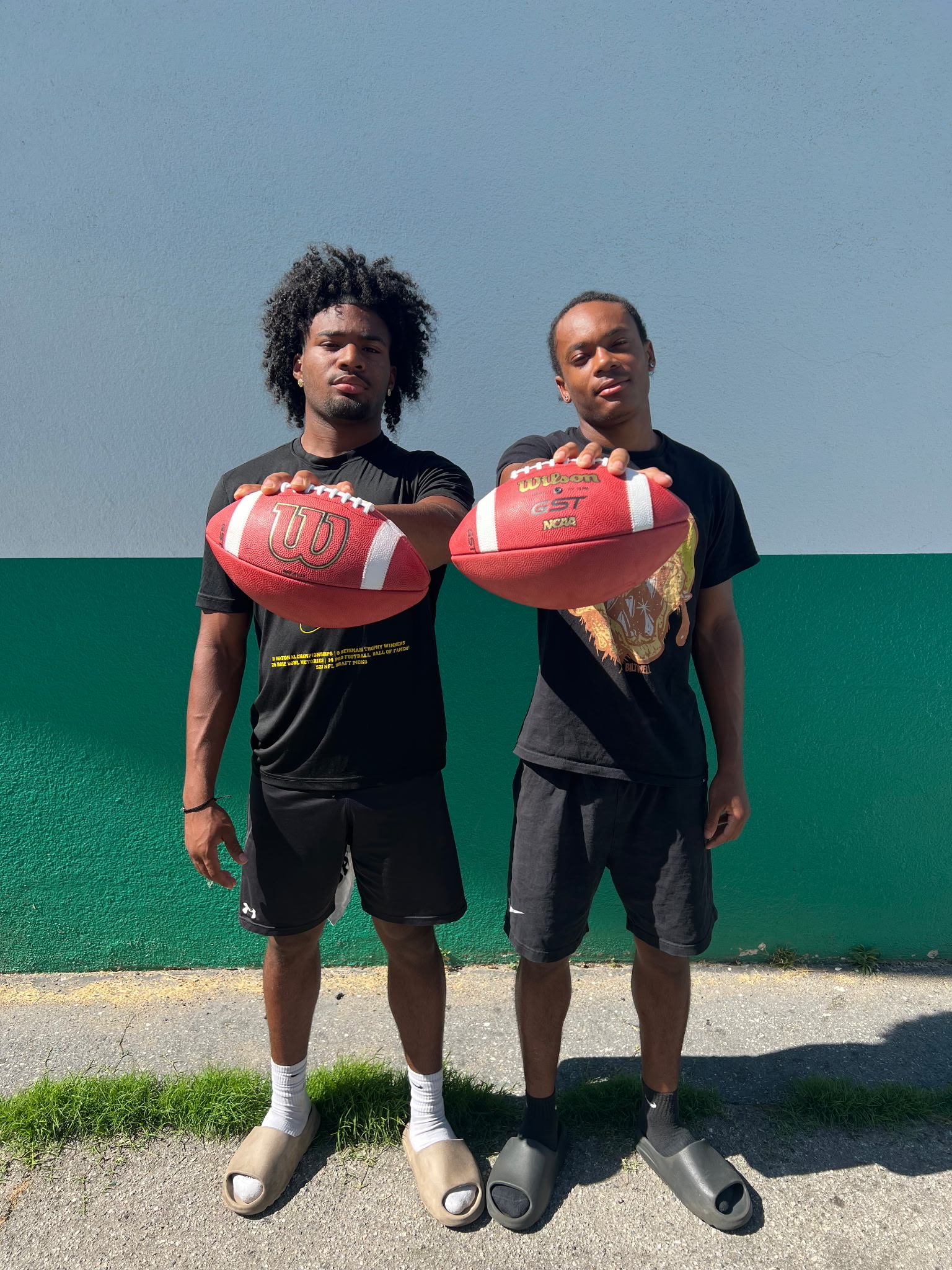 First image of two football players at a meetup we had in Washington 2025
