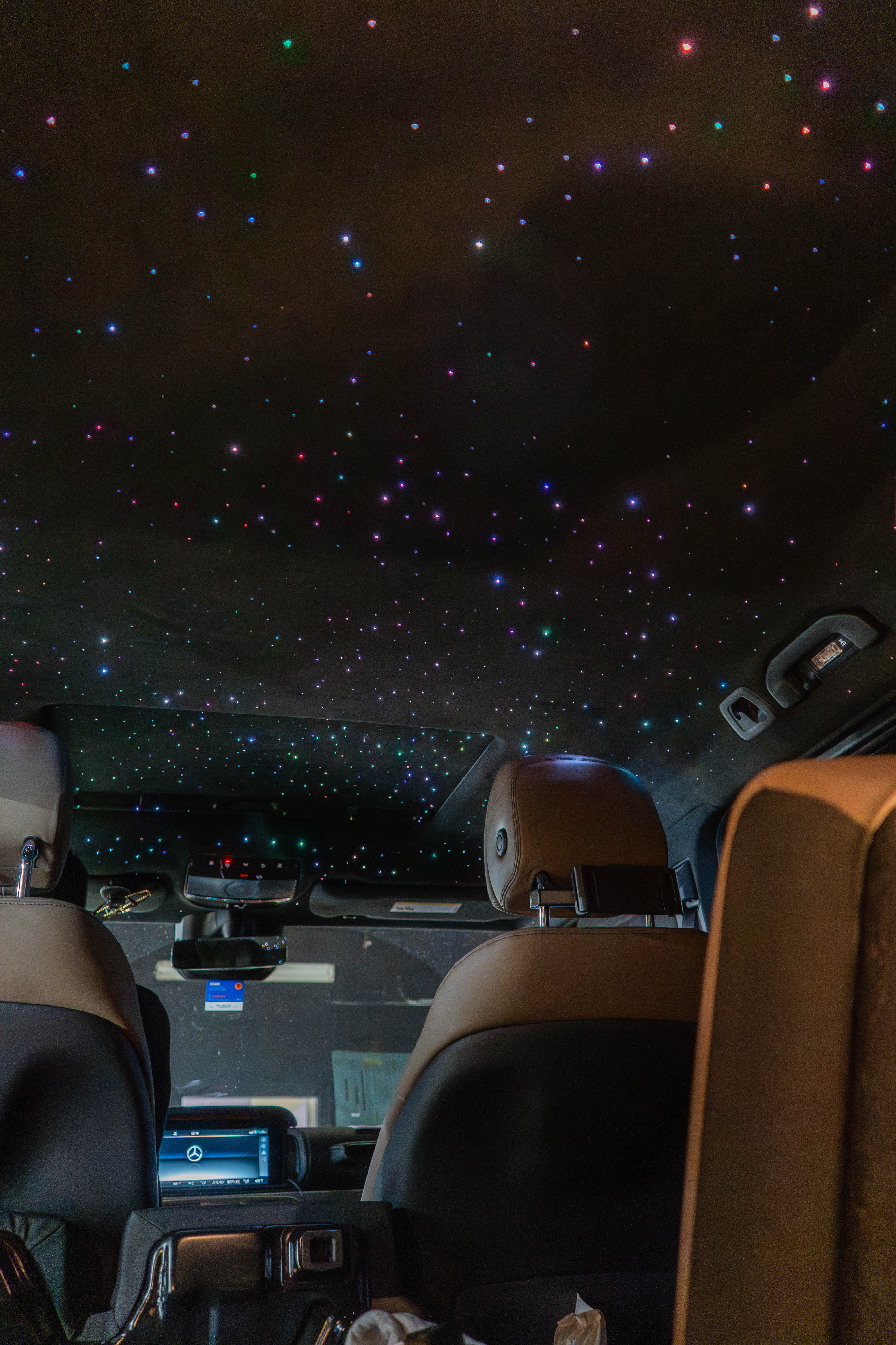 inside a car with stars in the sky
