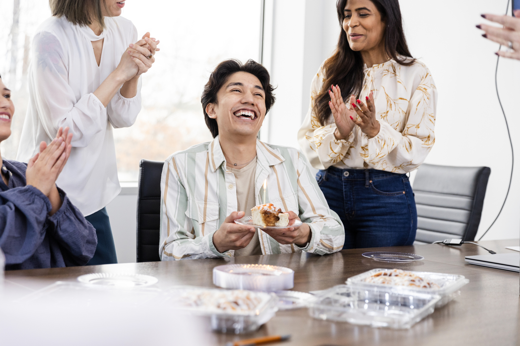Happy employee with a birthday gift