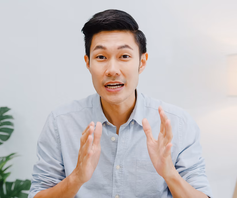 Manager recording an explainer video for his team.
