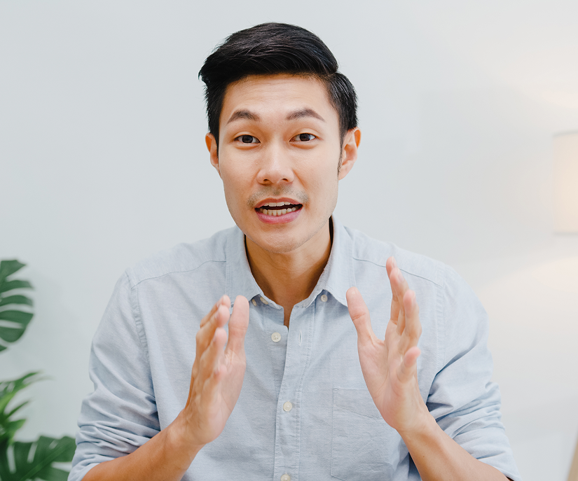 Manager recording an explainer video for his team.