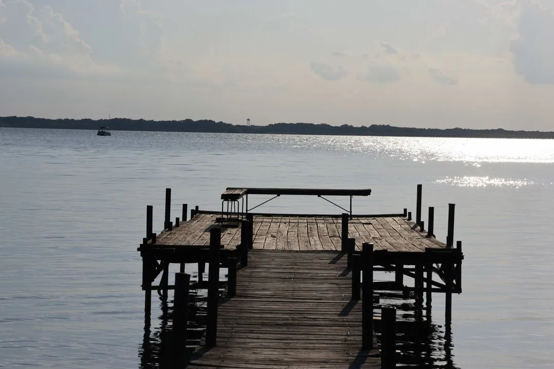 Wooden dock and boat slips on Lake Granbury