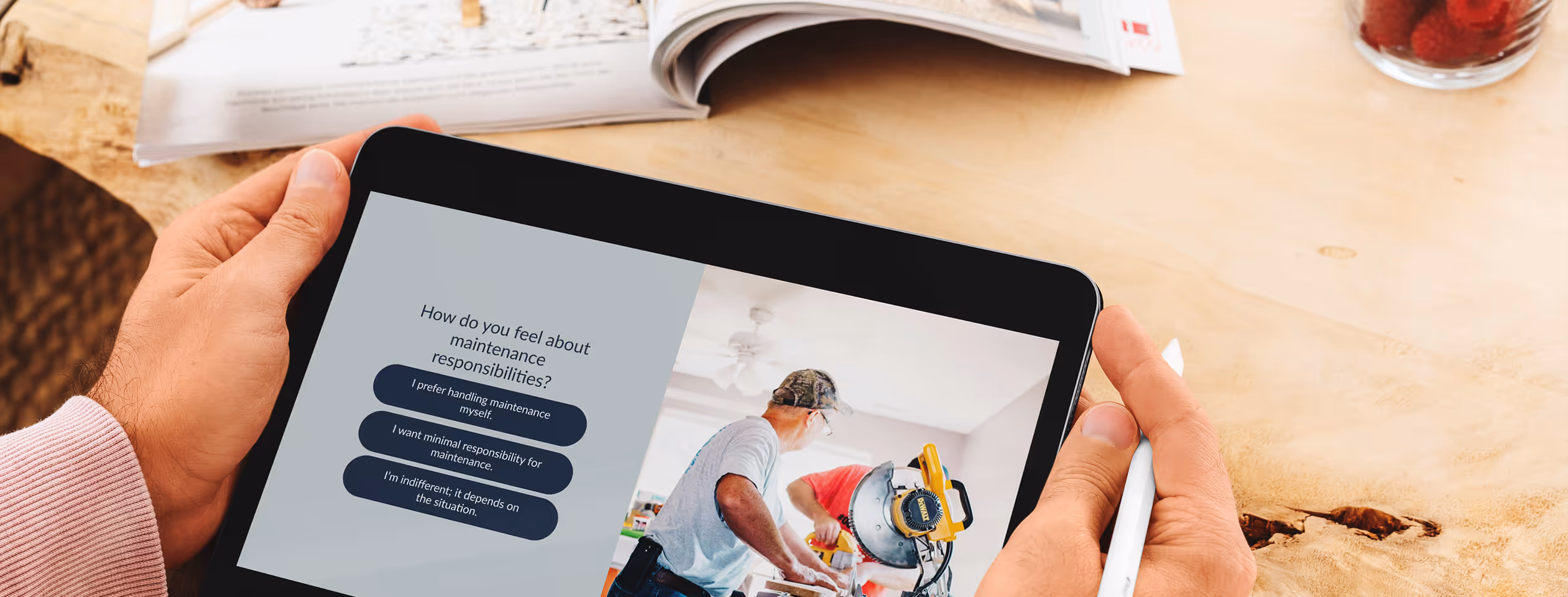 Close up photo of person holding iPad  with buy vs rent quiz question on screen. 
